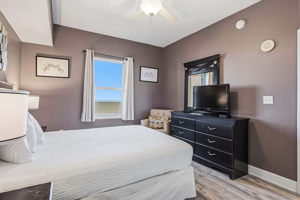 Elegant, beachfront condo with a furnished balcony, views & two pools