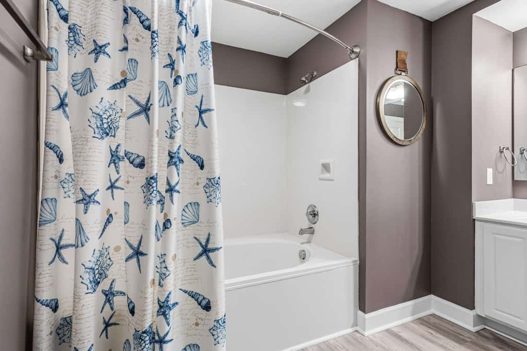 Elegant, beachfront condo with a furnished balcony, views & two pools