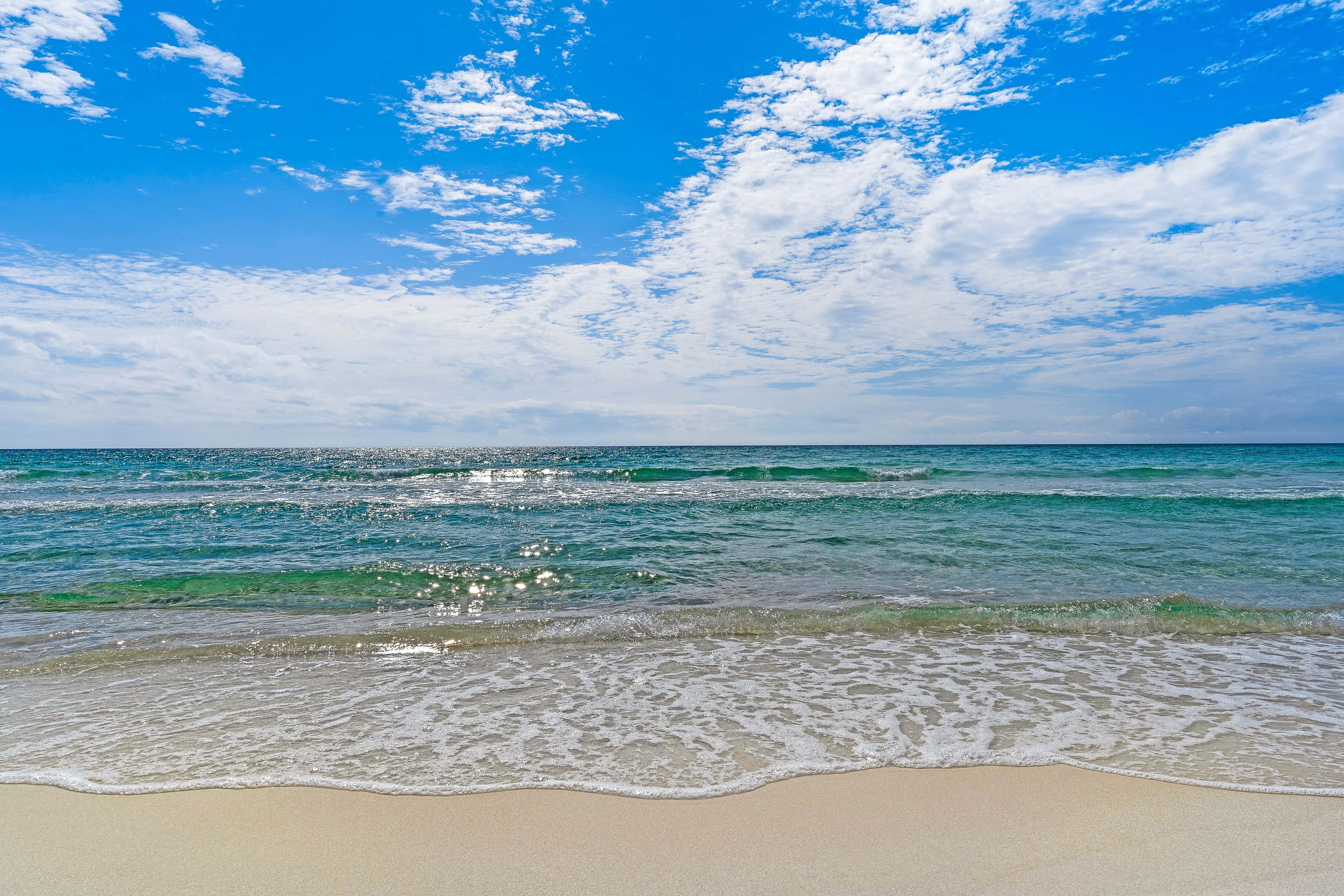 Gulf-front 3-bedroom condo with balconies off each bedroom & pickleball