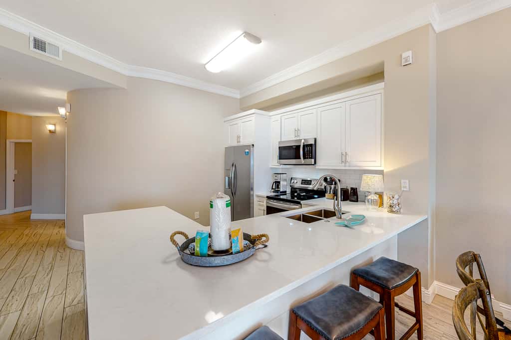 Amazing views at this renovated 4rth-floor condo with lagoon pool & pickleball
