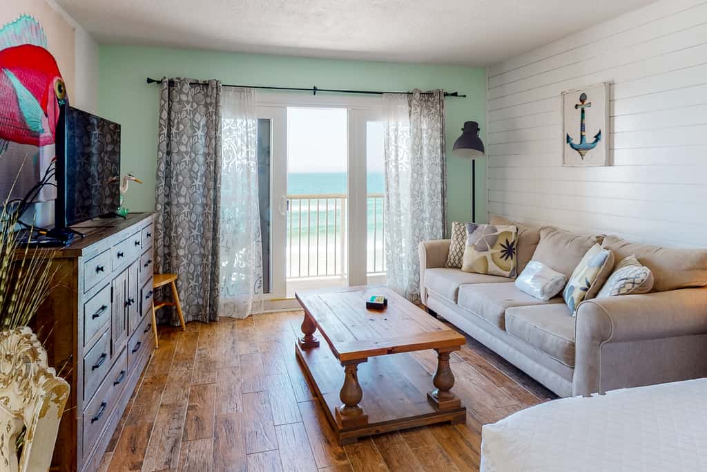 Modern oceanfront studio with pool access, central AC, and beach service