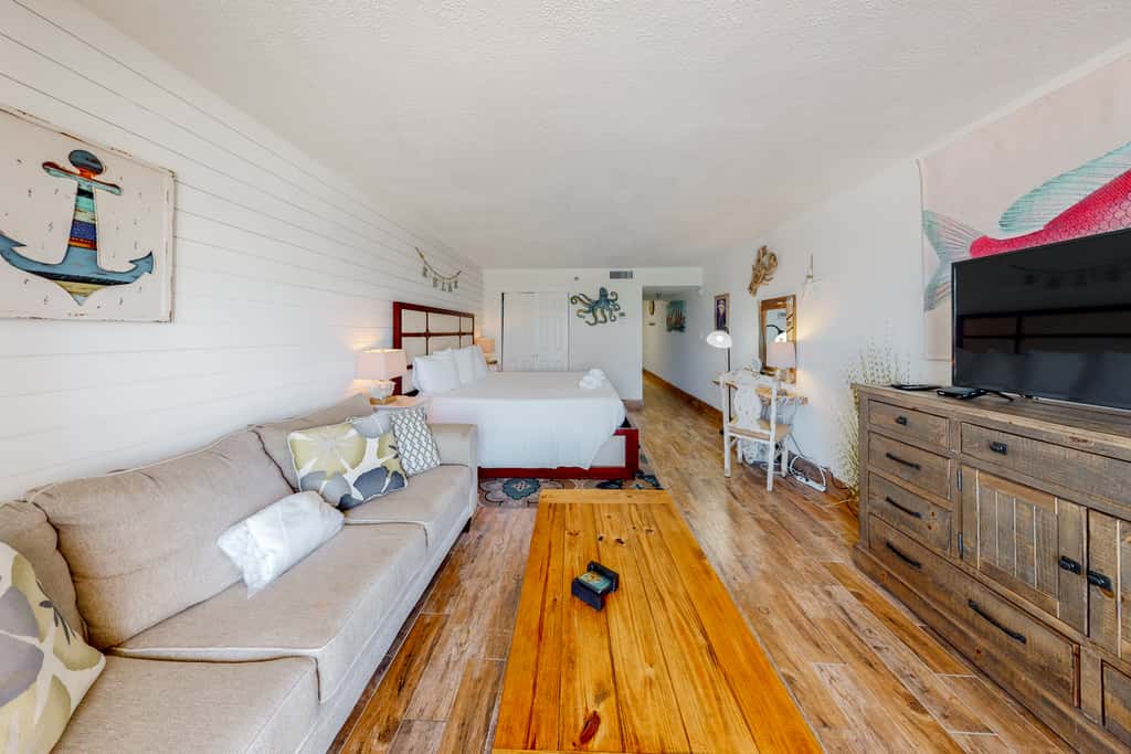 Modern oceanfront studio with pool access, central AC, and beach service