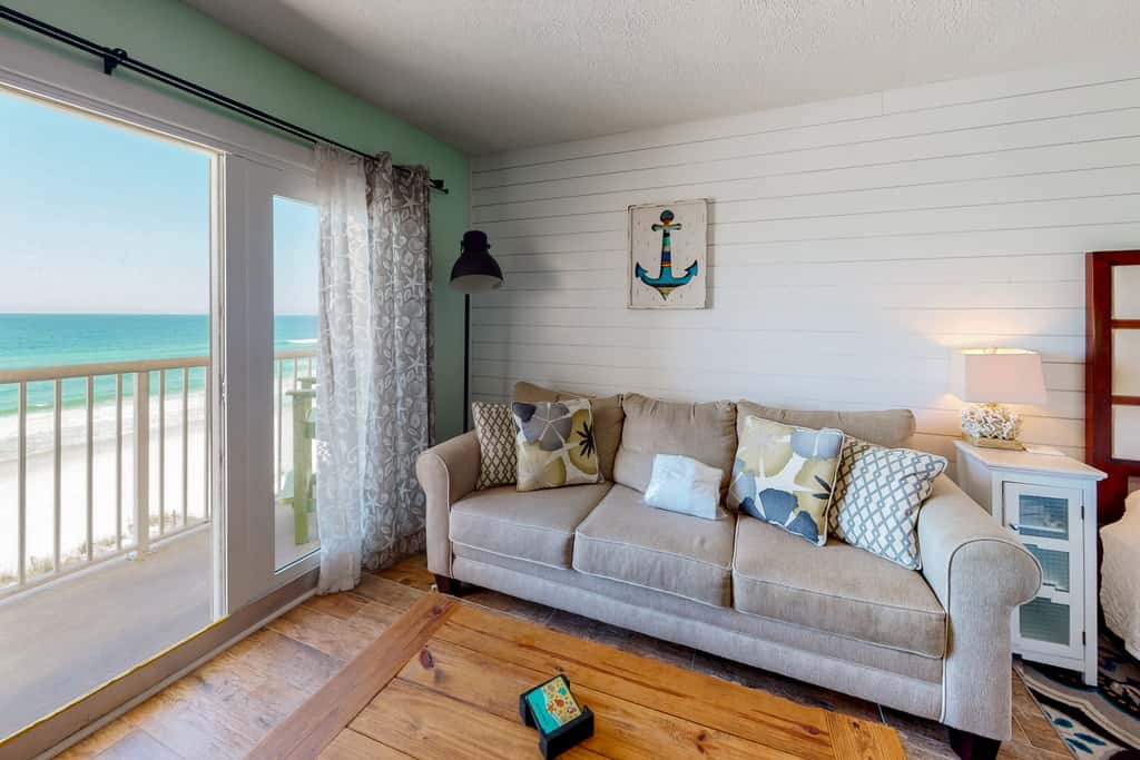 Modern oceanfront studio with pool access, central AC, and beach service