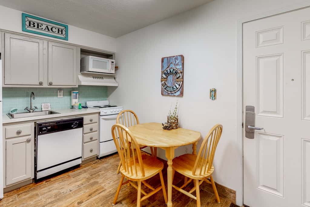 Modern oceanfront studio with pool access, central AC, and beach service