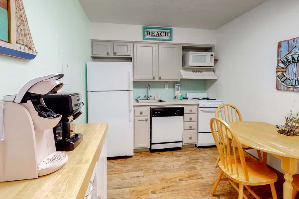 Modern oceanfront studio with pool access, central AC, and beach service
