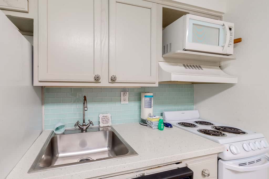 Modern oceanfront studio with pool access, central AC, and beach service