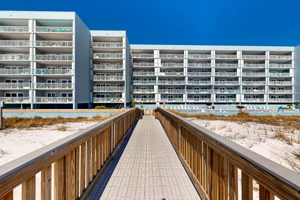 Modern oceanfront studio with pool access, central AC, and beach service