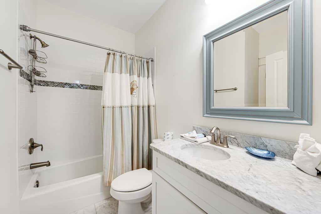 Gorgeous coastal home with shared pool - walk to beach, dining & shopping