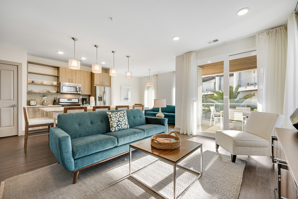 Third-floor luxury condo near beach with resort pool, gym & EV chargers