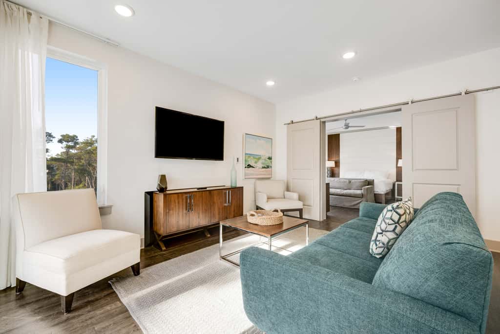 Third-floor luxury condo near beach with resort pool, gym & EV chargers