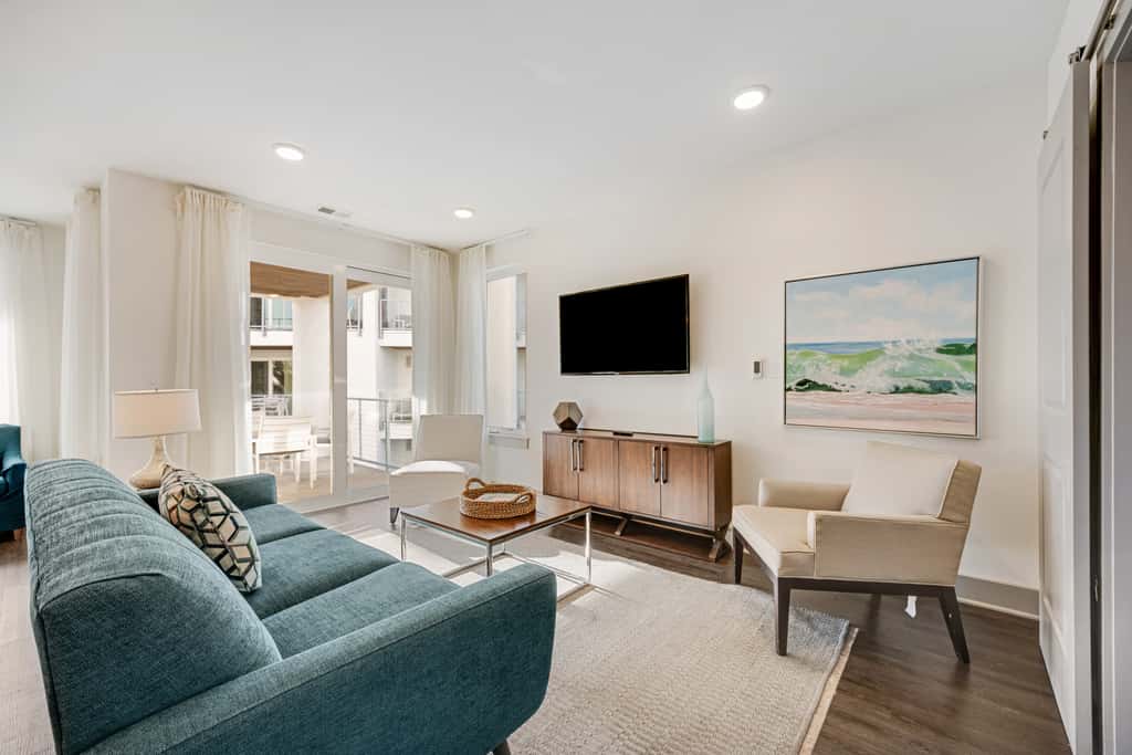 Third-floor luxury condo near beach with resort pool, gym & EV chargers