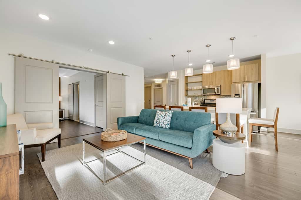 Third-floor luxury condo near beach with resort pool, gym & EV chargers