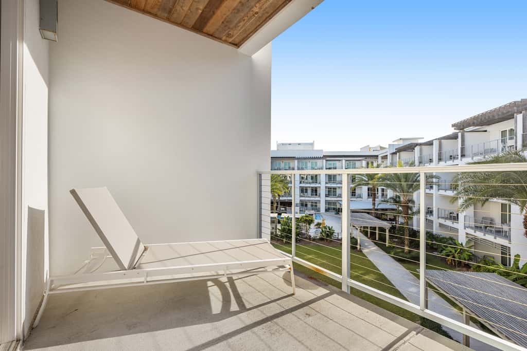 Third-floor luxury condo near beach with resort pool, gym & EV chargers