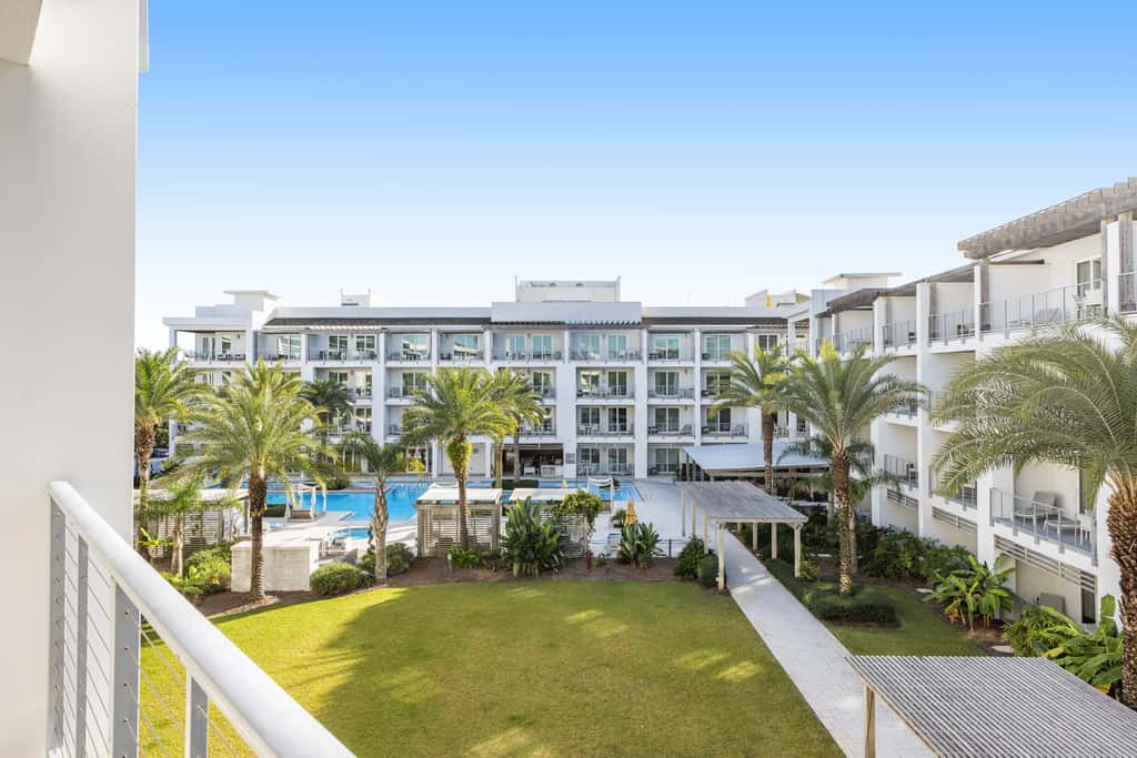 Third-floor luxury condo near beach with resort pool, gym & EV chargers
