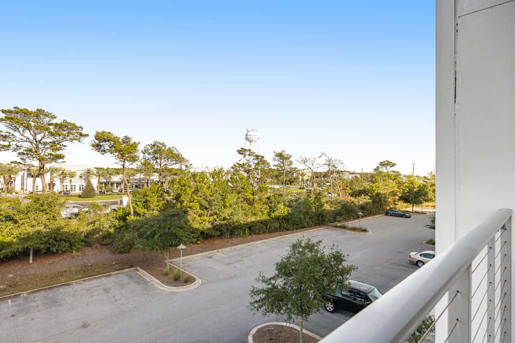 Third-floor luxury condo near beach with resort pool, gym & EV chargers