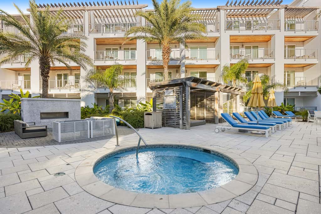Third-floor luxury condo near beach with resort pool, gym & EV chargers