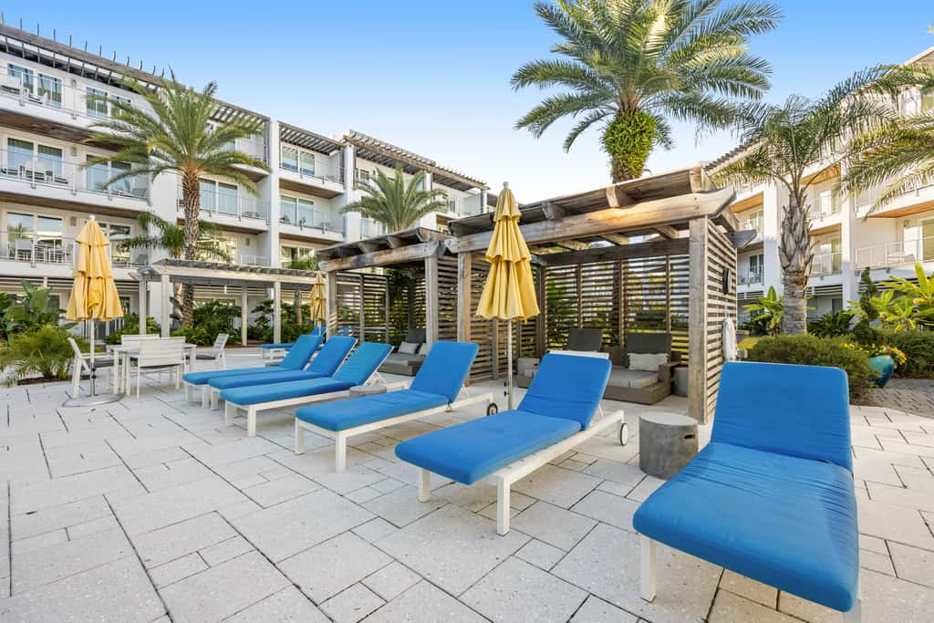 Third-floor luxury condo near beach with resort pool, gym & EV chargers