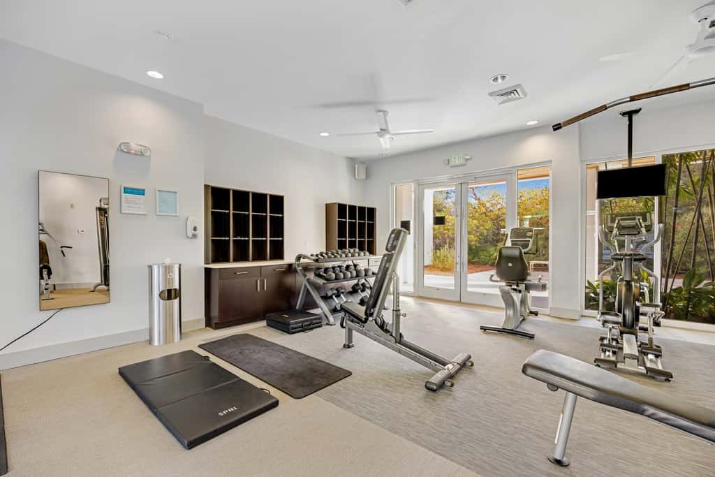 Third-floor luxury condo near beach with resort pool, gym & EV chargers