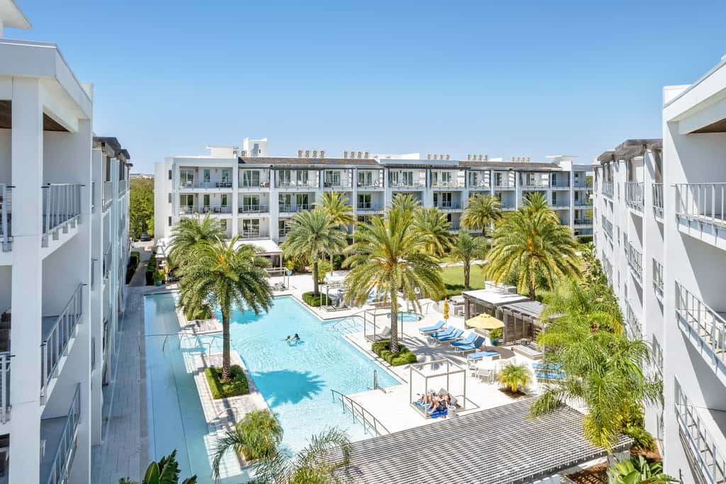 Third-floor luxury condo near beach with resort pool, gym & EV chargers