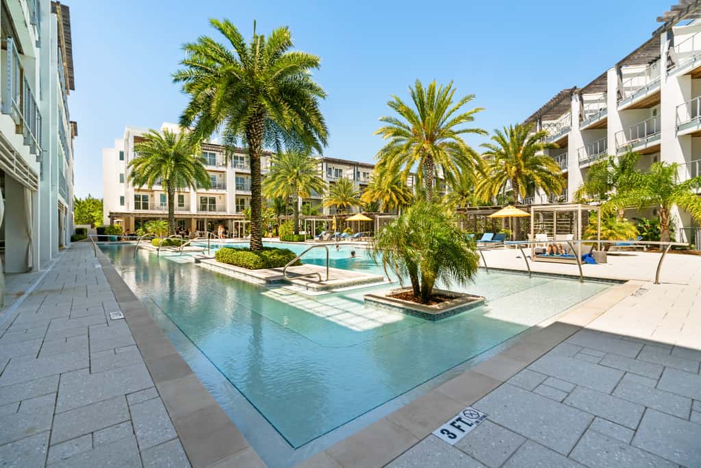Third-floor luxury condo near beach with resort pool, gym & EV chargers