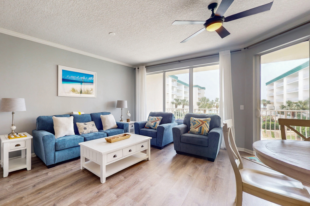 Attractive home with spacious balcony, pool view & pickleball - near beach
