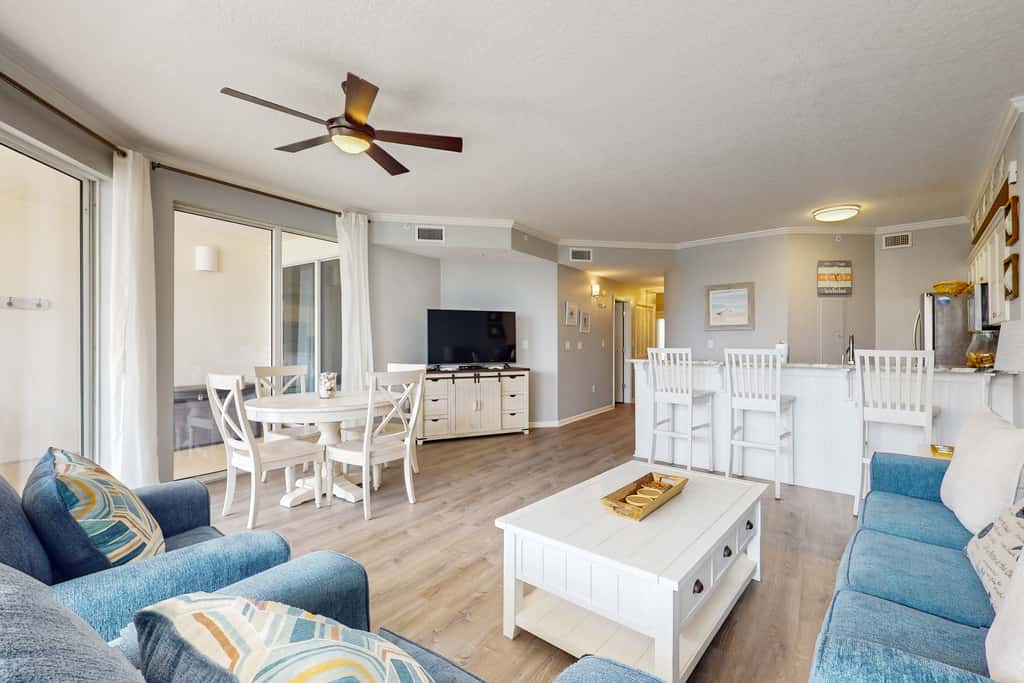Attractive home with spacious balcony, pool view & pickleball - near beach