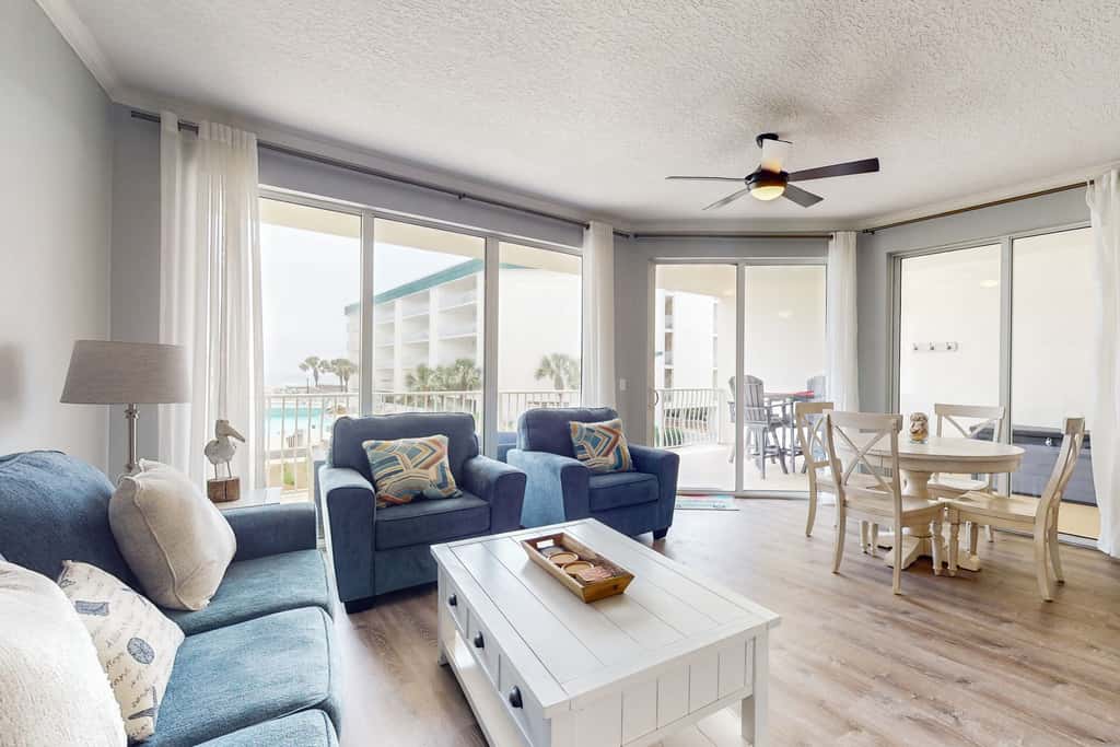 Attractive home with spacious balcony, pool view & pickleball - near beach