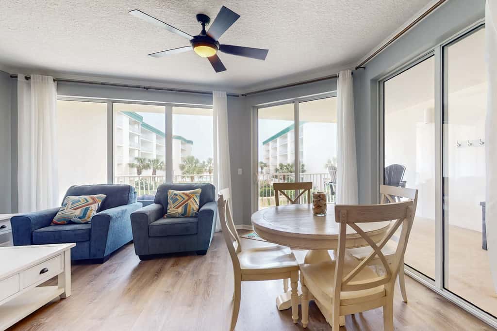 Attractive home with spacious balcony, pool view & pickleball - near beach