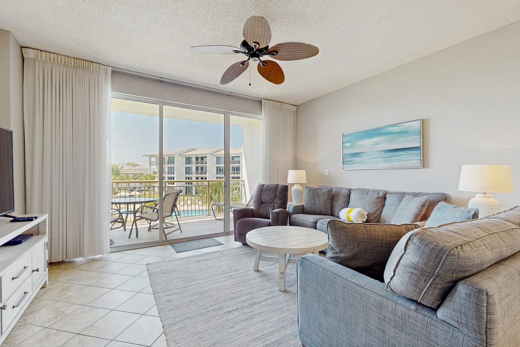 Airy beachfront condo with balcony views, lagoon pool, tennis & pickleball