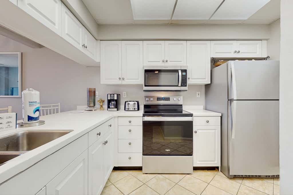 Airy beachfront condo with balcony views, lagoon pool, tennis & pickleball