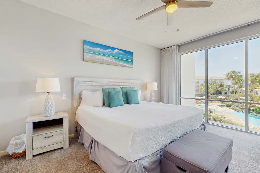 Airy beachfront condo with balcony views, lagoon pool, tennis & pickleball