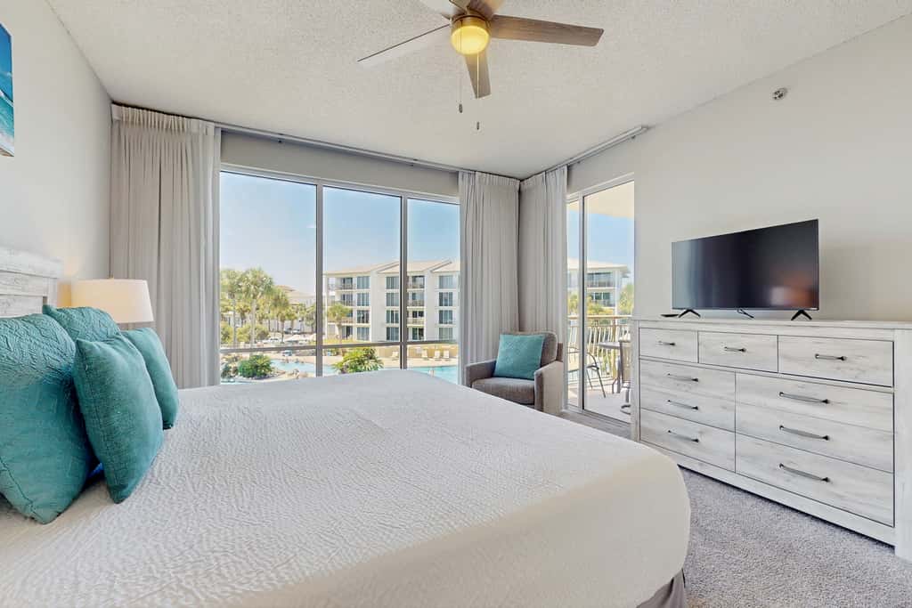 Airy beachfront condo with balcony views, lagoon pool, tennis & pickleball