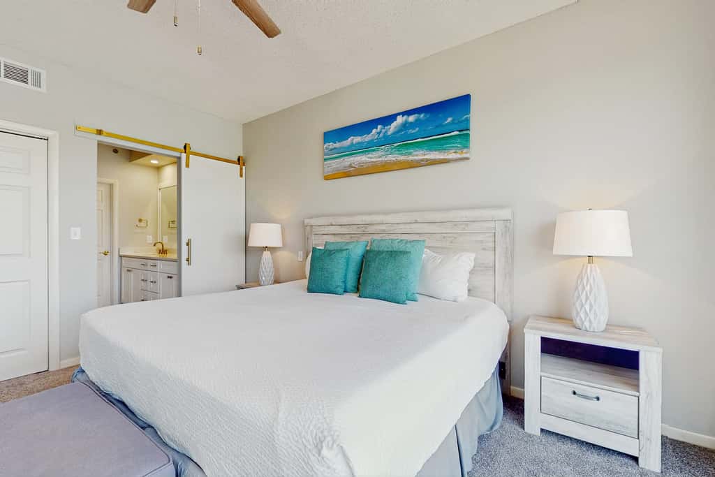 Airy beachfront condo with balcony views, lagoon pool, tennis & pickleball