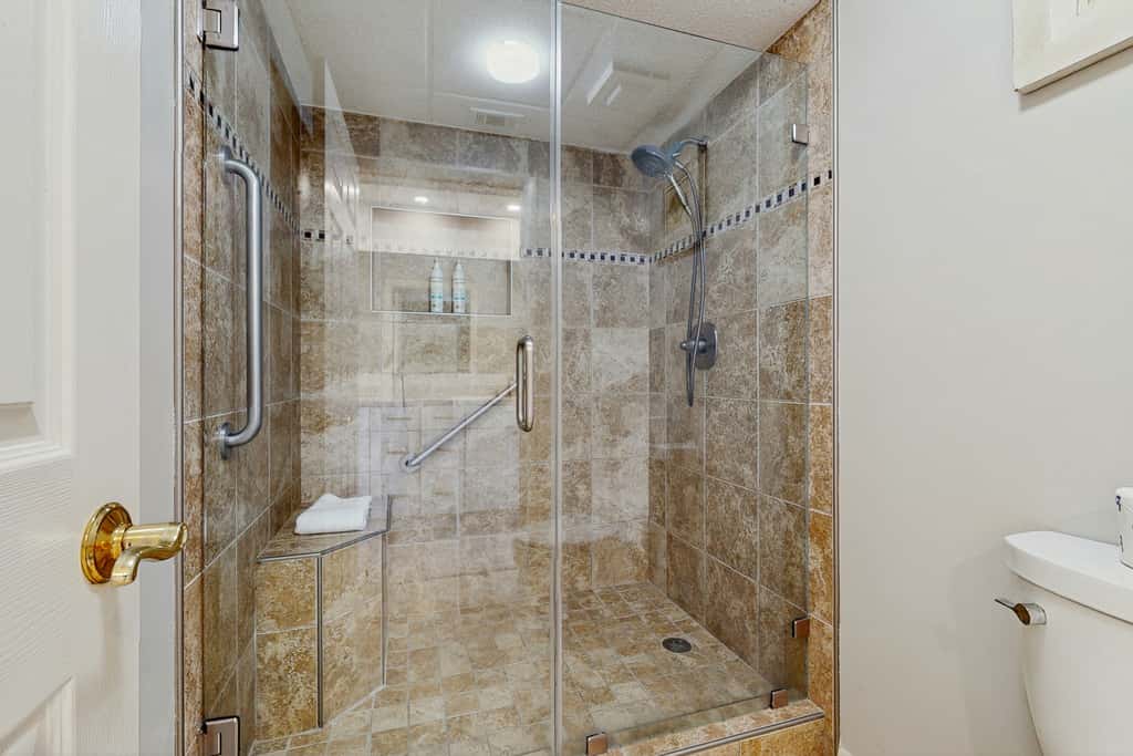 Airy beachfront condo with balcony views, lagoon pool, tennis & pickleball