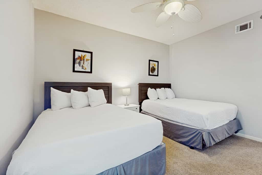 Airy beachfront condo with balcony views, lagoon pool, tennis & pickleball