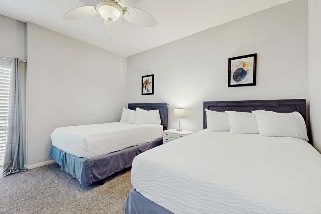 Airy beachfront condo with balcony views, lagoon pool, tennis & pickleball