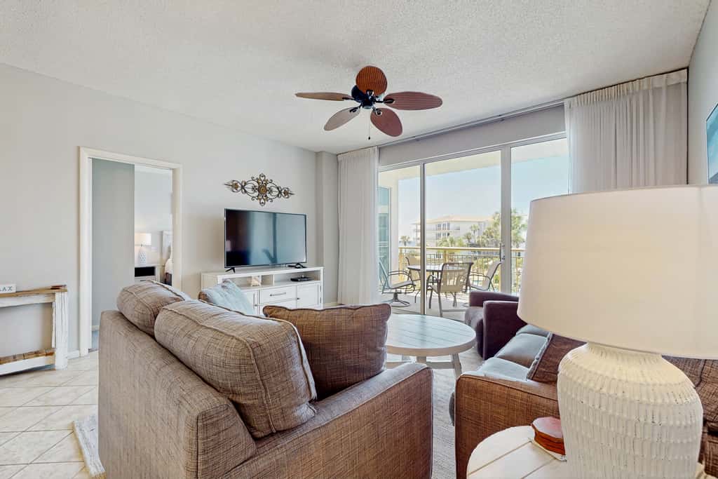 Airy beachfront condo with balcony views, lagoon pool, tennis & pickleball