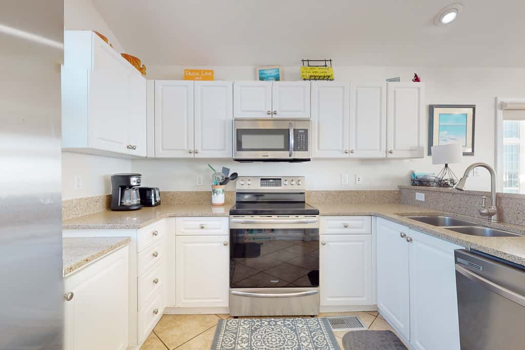 Gulf-front house near golf with pool, ocean views, beach access, & balcony