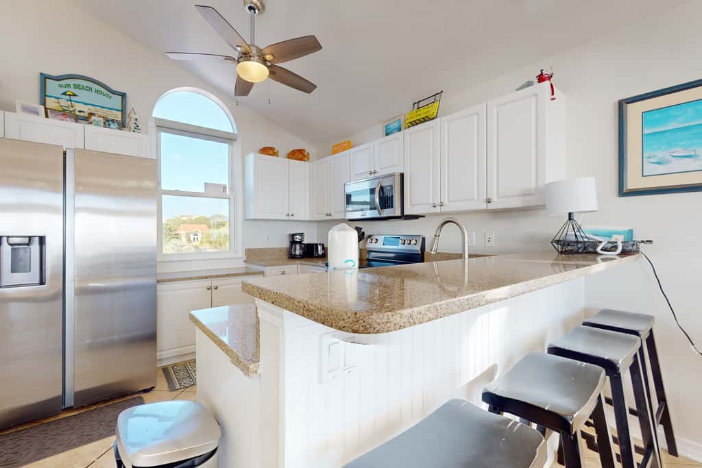 Gulf-front house near golf with pool, ocean views, beach access, & balcony