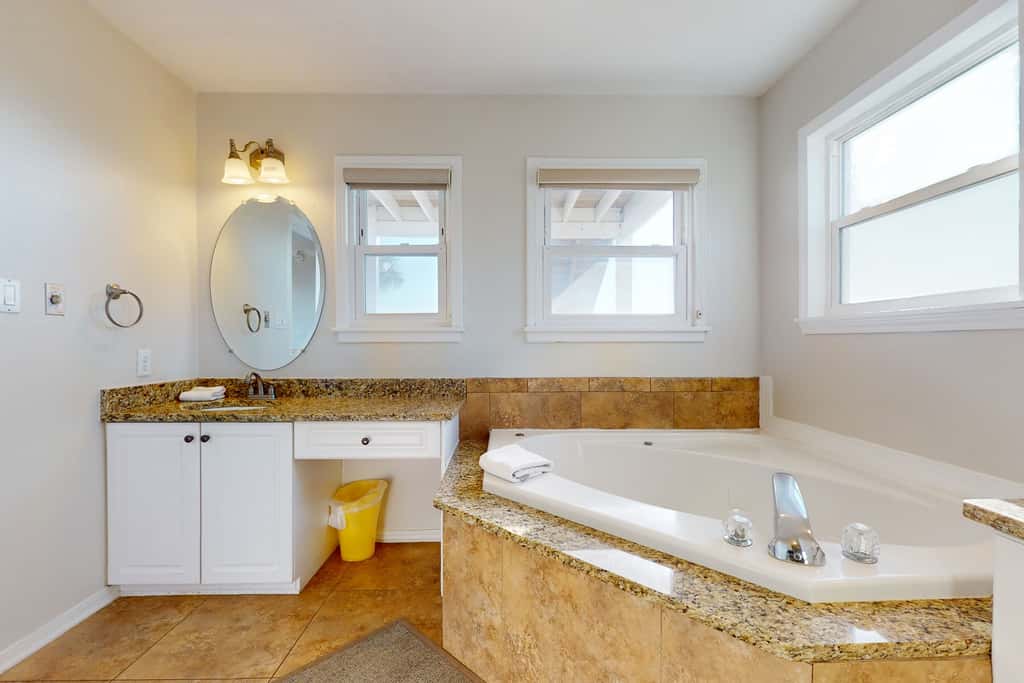 Gulf-front house near golf with pool, ocean views, beach access, & balcony