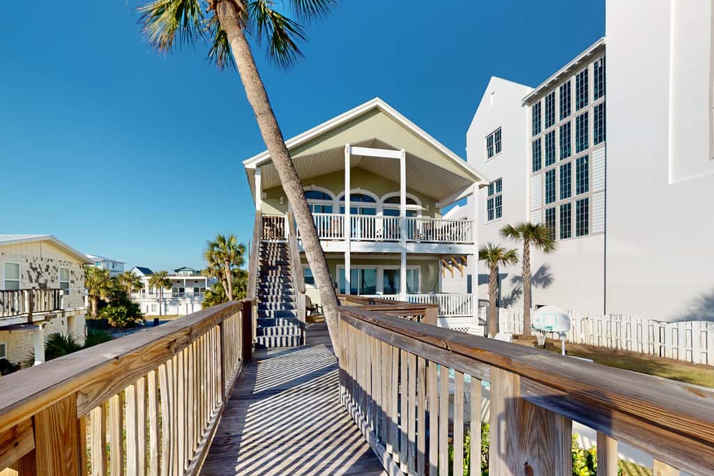 Gulf-front house near golf with pool, ocean views, beach access, & balcony