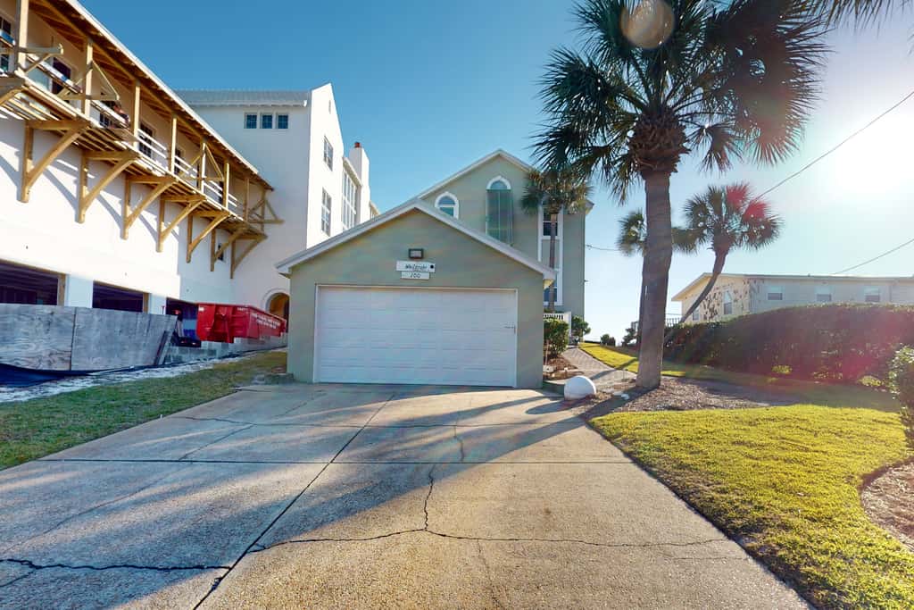 Gulf-front house near golf with pool, ocean views, beach access, & balcony