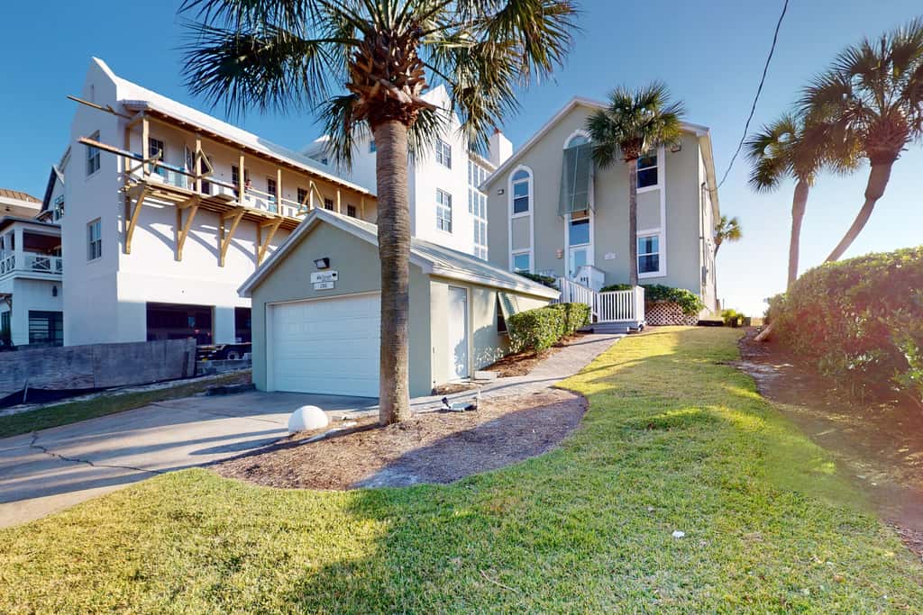 Gulf-front house near golf with pool, ocean views, beach access, & balcony