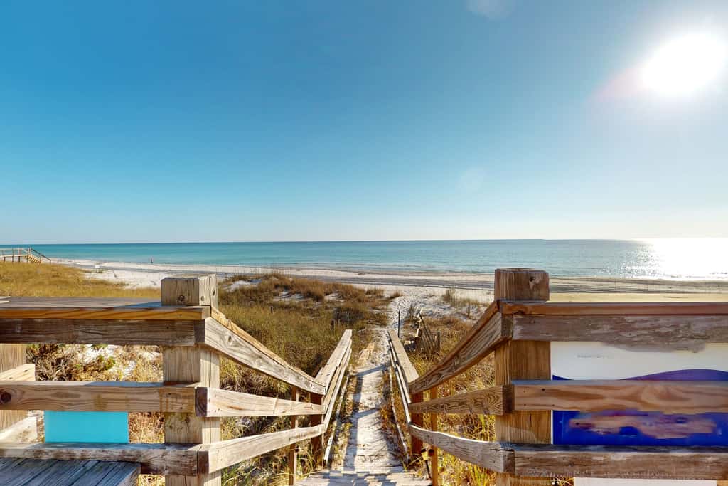 Gulf-front house near golf with pool, ocean views, beach access, & balcony