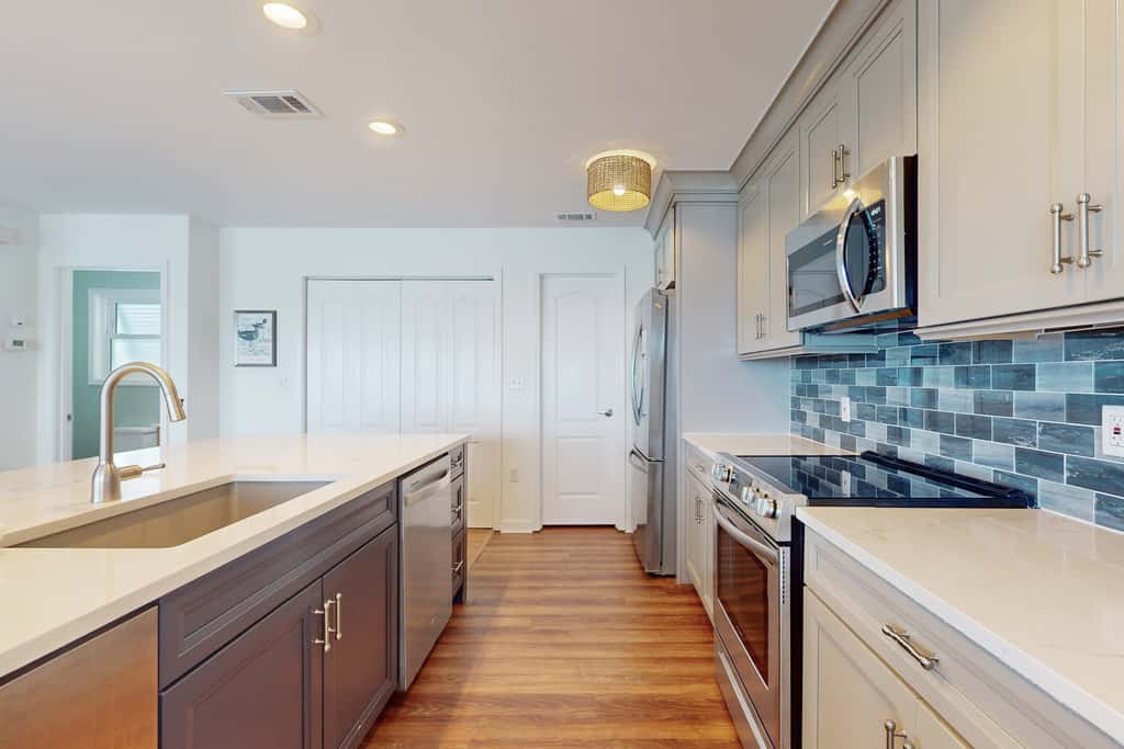 Spacious & updated waterfront home w decks, beach views & private boardwalk