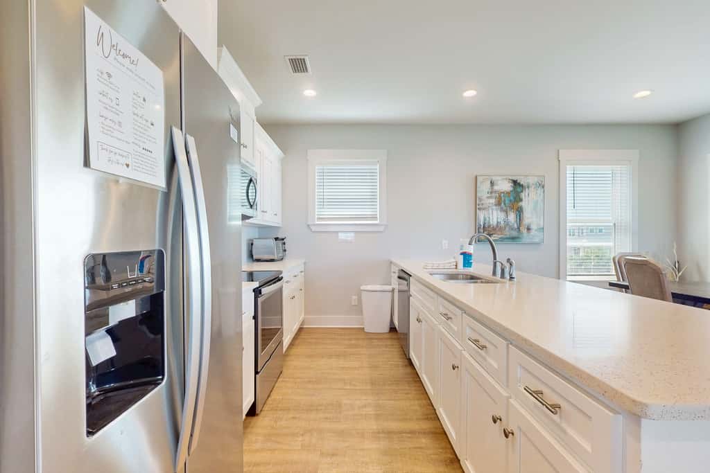 Pristine, professionally furnished beach house with two balconies - near beach