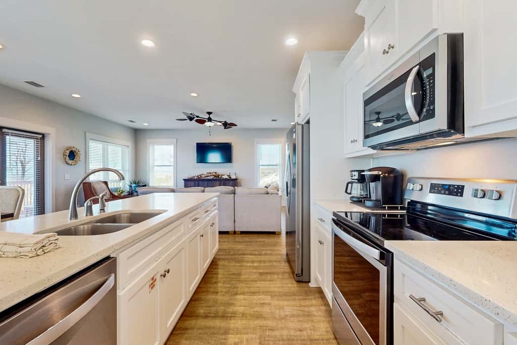 Pristine, professionally furnished beach house with two balconies - near beach