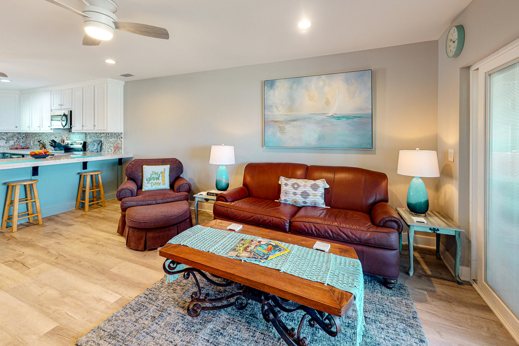 Updated home across from beach with firepit, sunroom, & fast WiFi - snowbirds OK