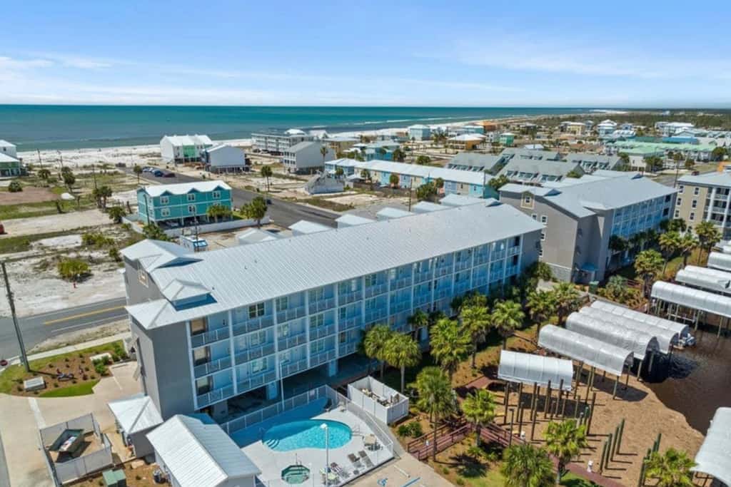 Waterfront condo with pool, hot tub, furnished lanai, fireplace & chic furniture