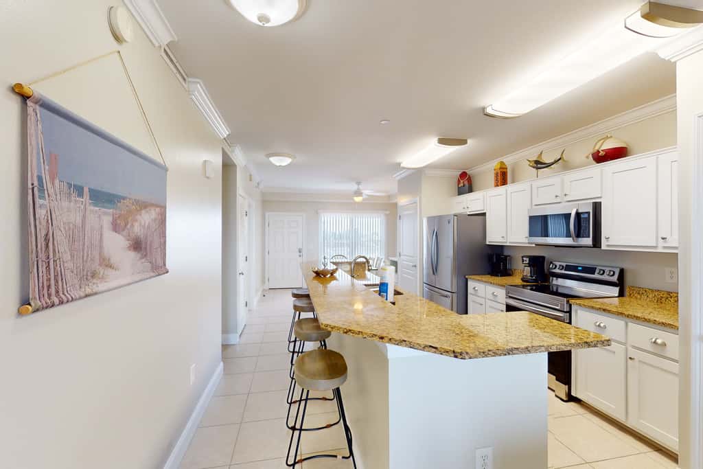 Waterfront condo with pool, hot tub, furnished lanai, fireplace & chic furniture